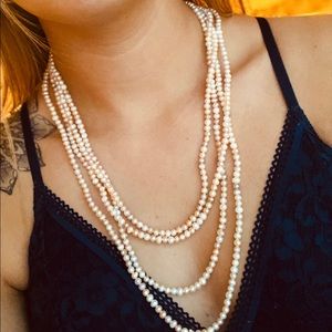 LONG strand of real pearls